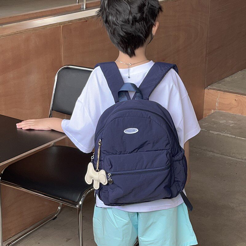 时尚新款儿童幼儿园书包韩版高级质感男童双肩包轻便减负女童背包