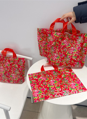 东北大花喜庆大红色塑料衣物服饰女装店用手提袋子礼品购物手拎袋