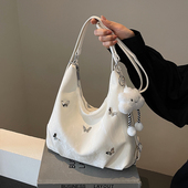 大容量秋冬包包女2025新款 时尚 通勤双肩后背包多用单肩水桶托特包