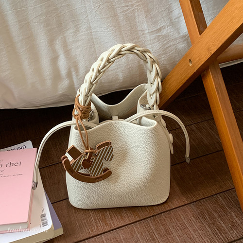 小众麻花通勤手提斜挎水桶包