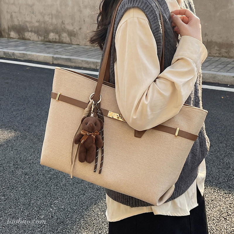 时尚大容量帆布包包女2026新款通勤单肩包外出上班手提托特水桶包,箱包皮具/热销女包/男包,托特包,淘宝优惠券,粉丝福利购,淘宝优惠卷