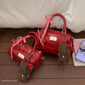 高级感红色手提包包女2026新款 小众压花枕头包精致单肩斜挎包 时尚