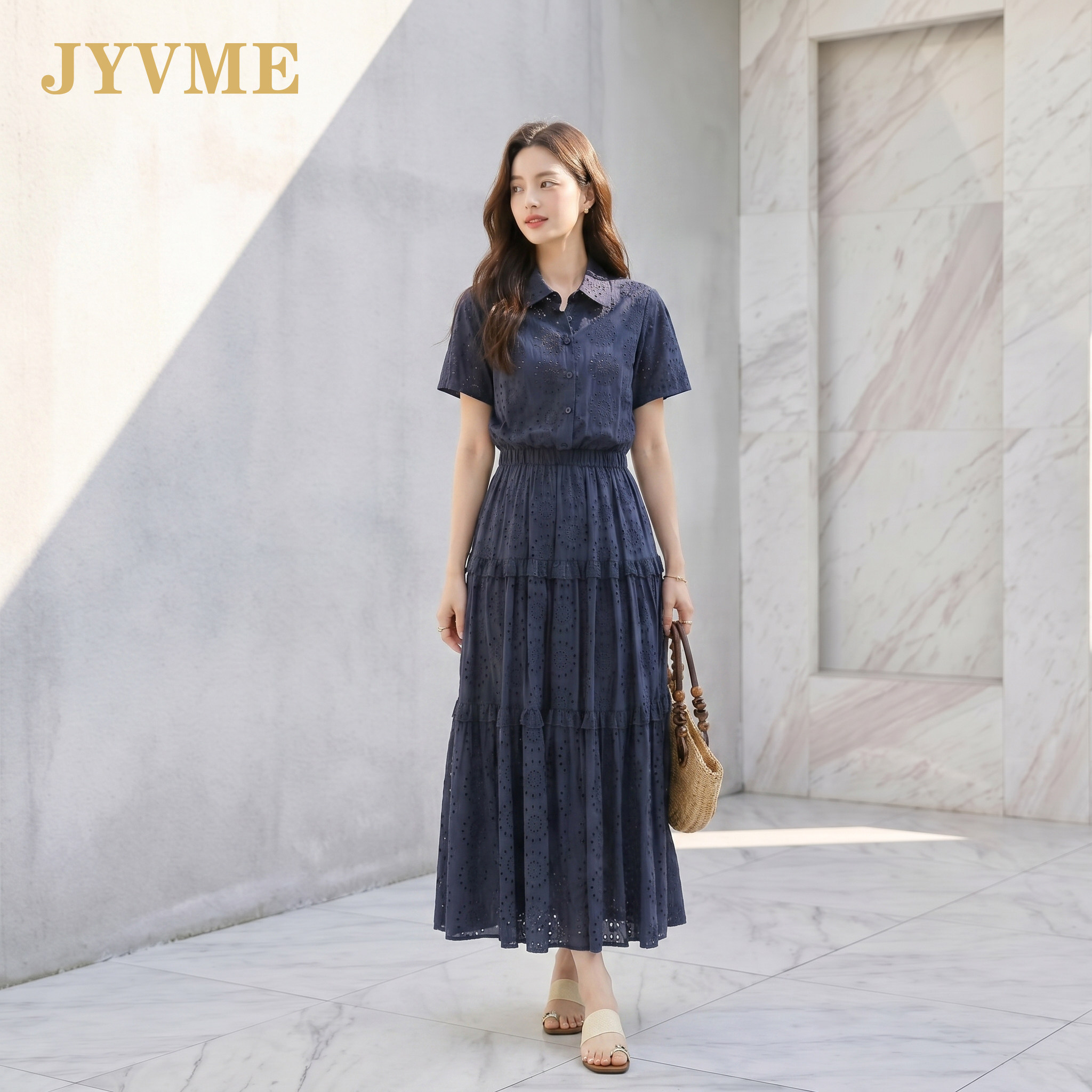 JyVme轻奢夏季新款2026茶歇裙藏青色镂空绣花高端中长款连衣裙
