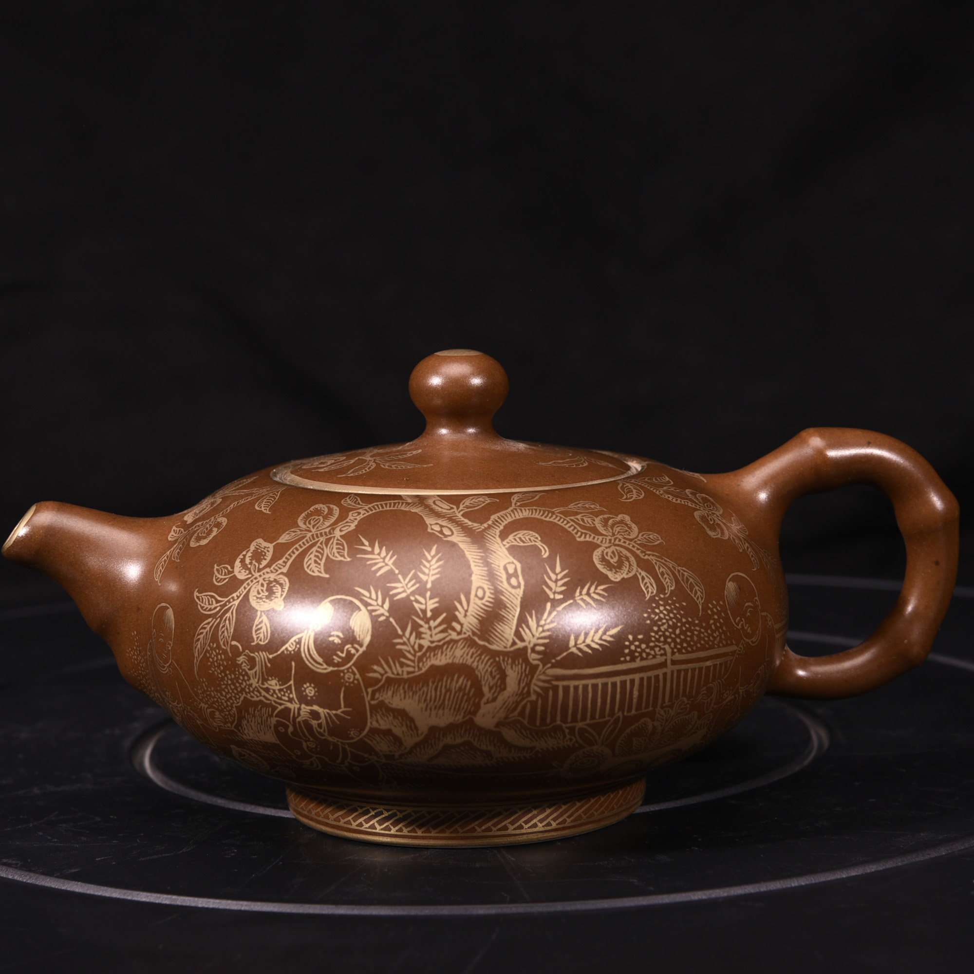 大清乾隆年制紫金釉本色真金婴戏图纹酒壶茶壶