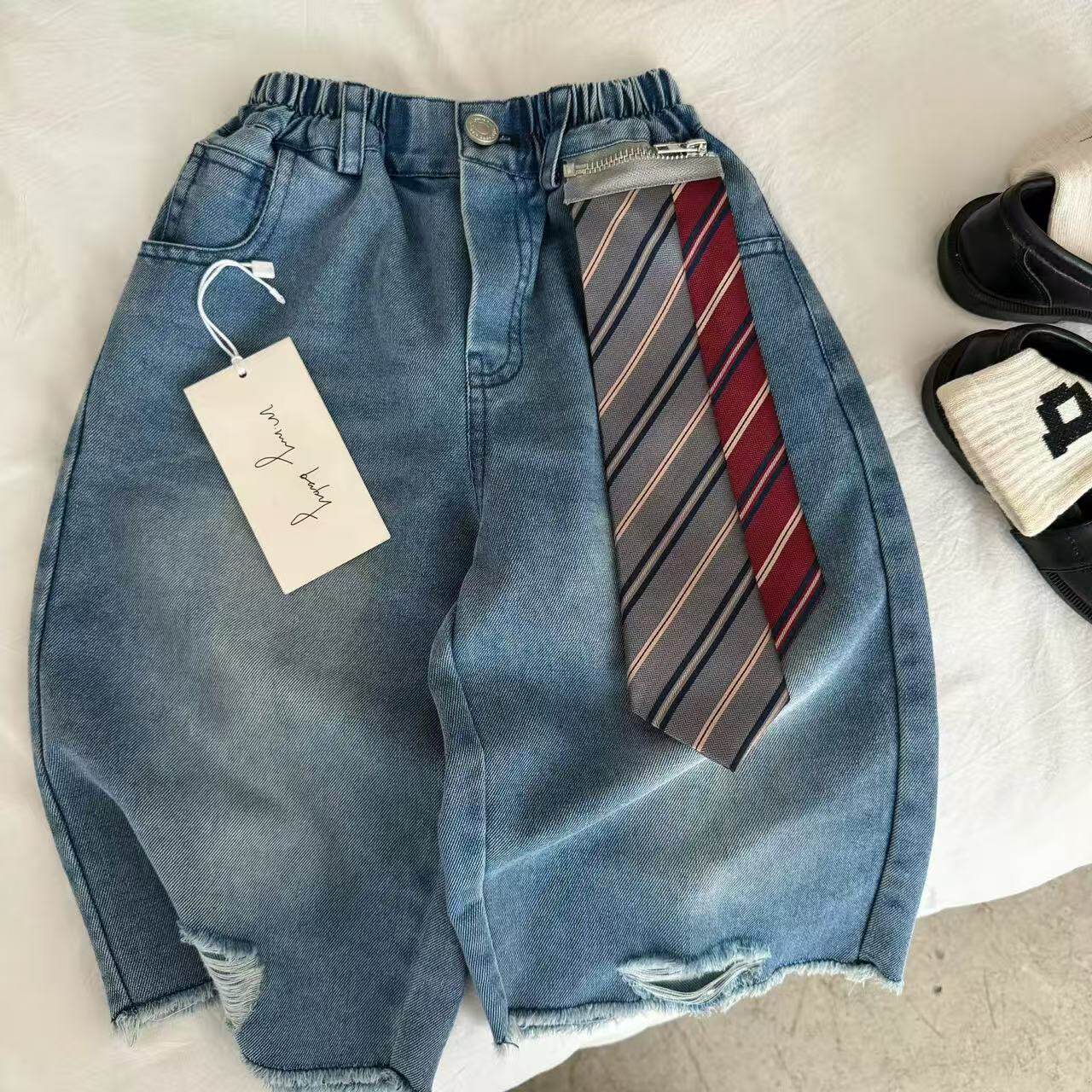 儿童软牛仔裤男夏季2026新款破洞9分裤男女宝宝毛边薄裤潮