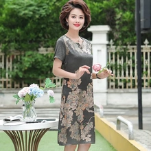 潮唯品会特卖清仓特价处理断码短袖真丝桑蚕丝连衣裙女装品牌正品