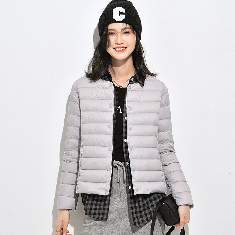 唯品会特卖断码清仓特价处理轻薄白鸭绒羽绒服女装品牌正品春秋冬