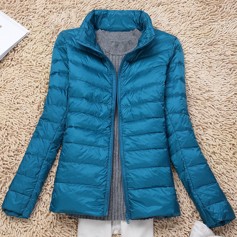 唯品会特卖断码清仓特价处理轻薄白鸭绒羽绒服女装品牌正品春秋冬