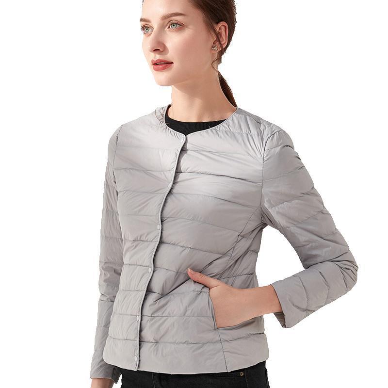 唯品会特卖断码清仓特价处理轻薄白鸭绒羽绒服女装品牌正品春秋冬