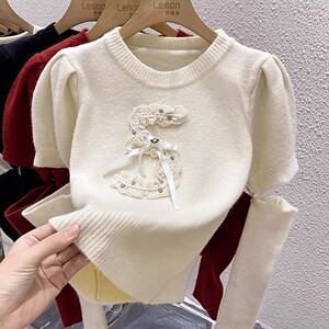 2023秋冬法式针织打底衫女短款毛衣设计感小众辣妹修身泡泡袖上衣