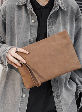 手拿包韩版男士手包疯马皮男包商务手抓信封包IPAD文件包新款