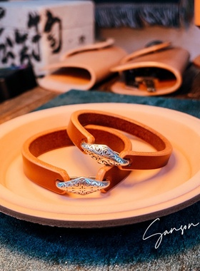 英伦风格情侣JE马缰革手工手环