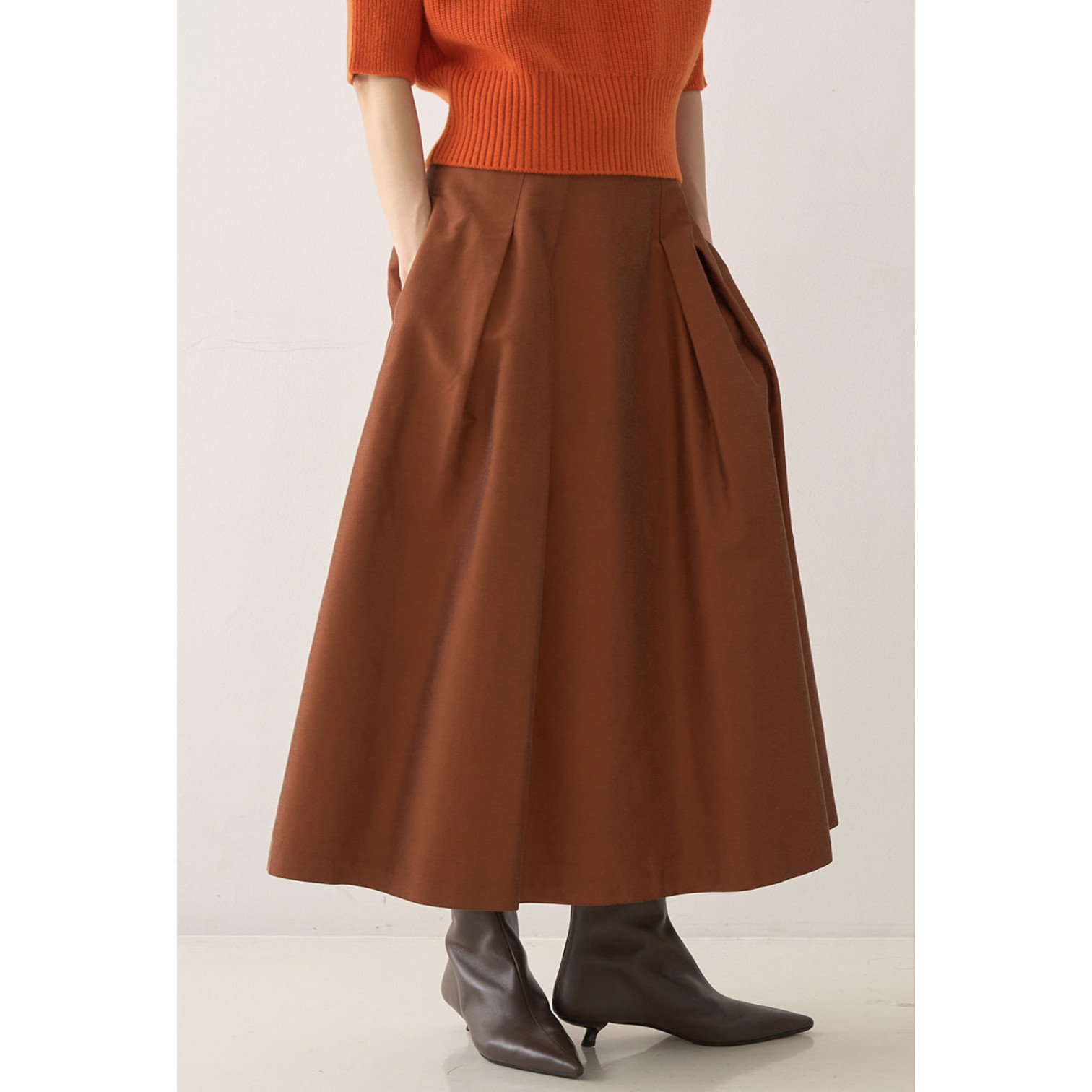 DW前后片立体褶裥光泽口袋半身裙