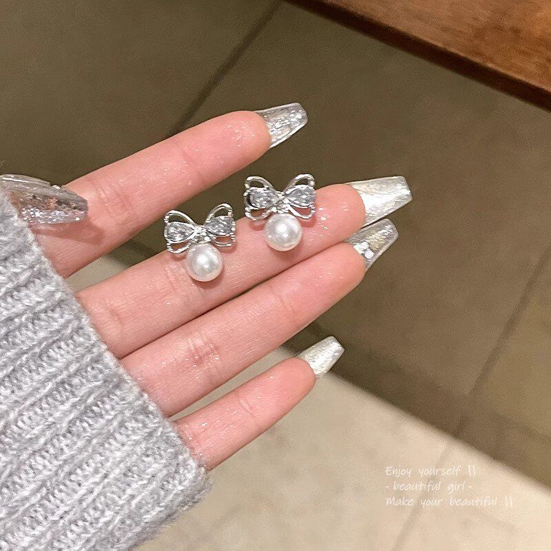 蝴蝶结珍珠银针耳钉女s925纯银夏季韩版森系轻奢设计微镶锆石耳环