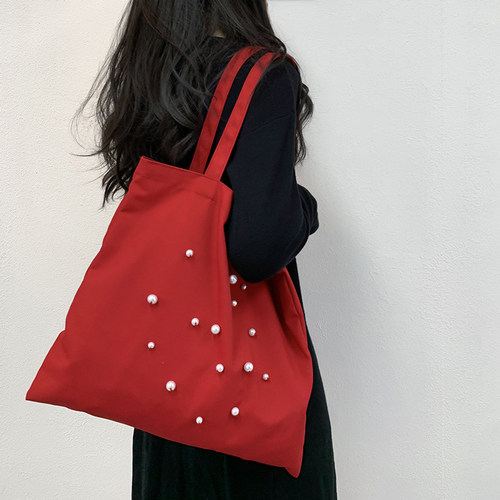 红色大容量珍珠手工帆布包