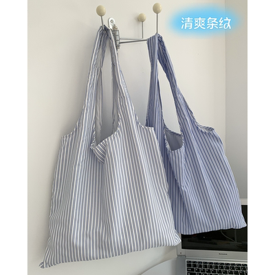 ins蓝色条纹背心布包包