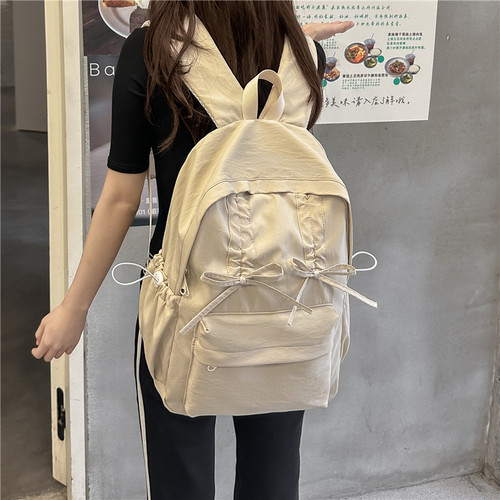 书包女生大学生褶皱抽绳蝴蝶结设计感外出小背包双肩包女旅游轻便