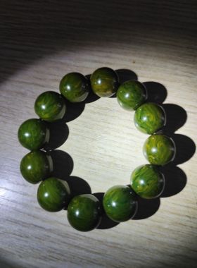 中东蜜蜡本来是孔雀兰色时间长了氧化成鸚鹉绿雪山手串小手围