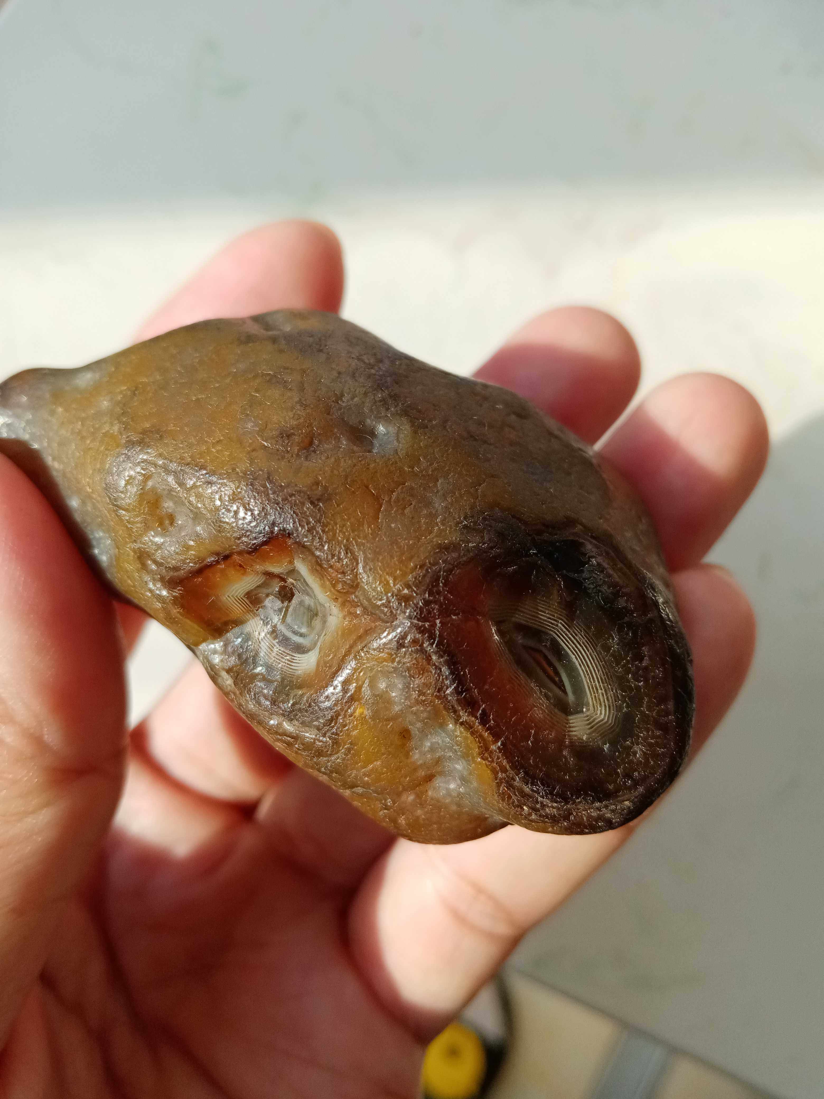 黑龙江瑰宝水冲精品闪丝天眼北红玛瑙奇石观赏石双眼看世界137克
