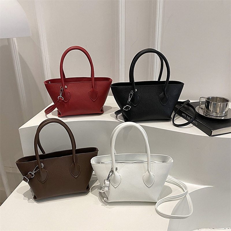 韩版小众简约时尚手提包2026春季新款简约通勤单肩包休闲斜挎包包