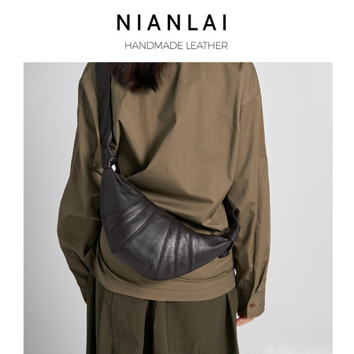 牛角包羊皮大容量简约斜挎包