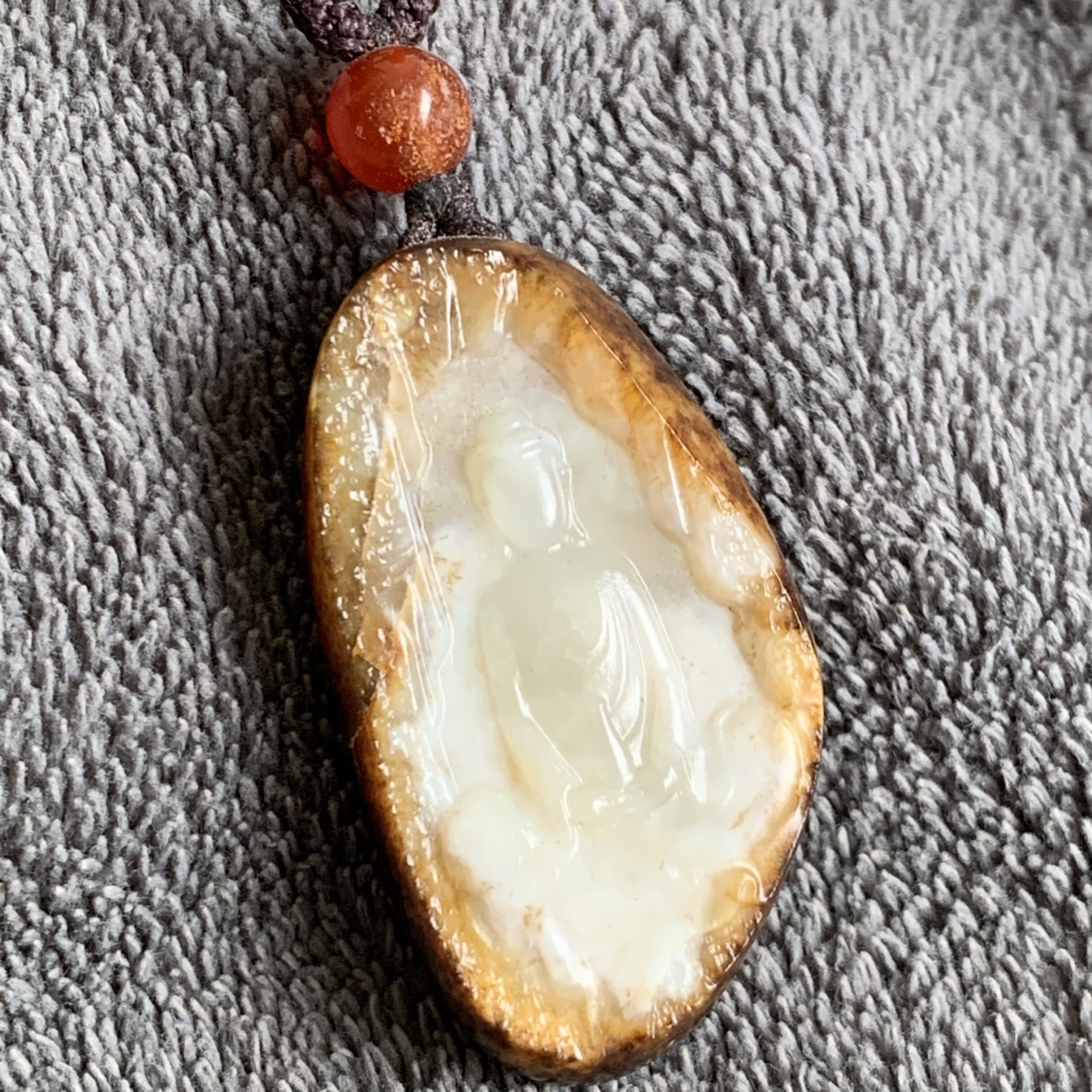 手艺人新疆和田玉籽料独籽 黑油皮无相佛悟道吊坠 天然原皮男女款