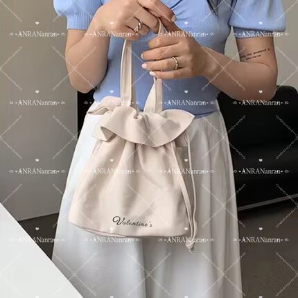荷叶边抽带手提袋小众ins简约纯色逛街手提包森女文艺百搭帆布袋