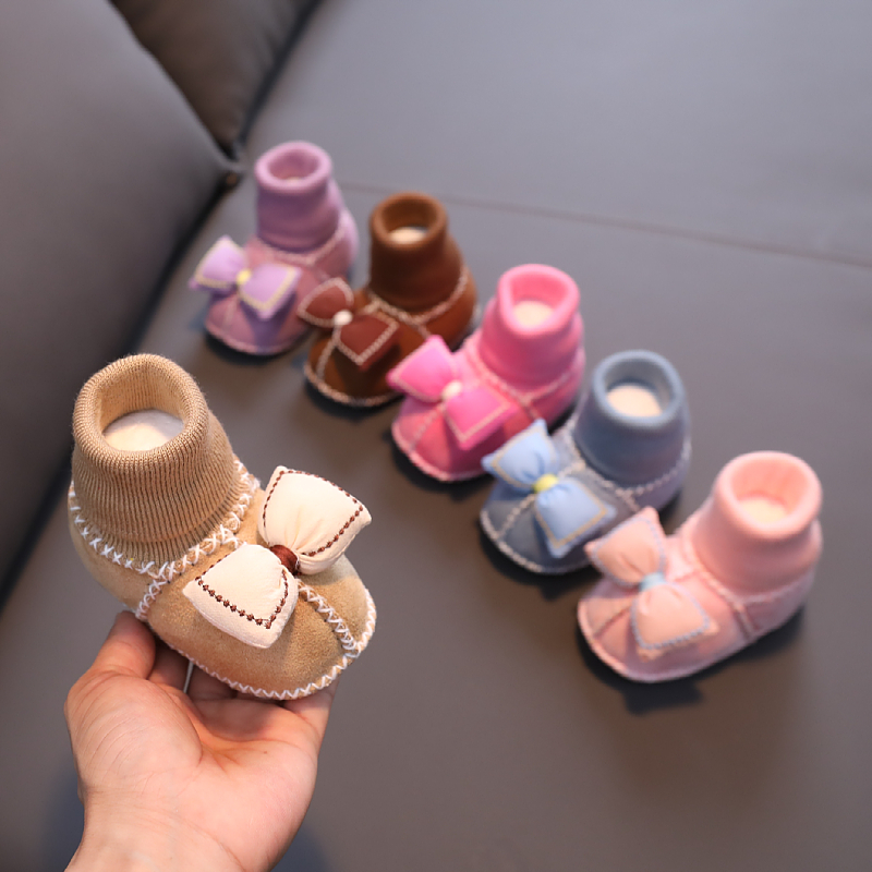 蝴蝶结公主仿皮毛一体鞋袜保暖