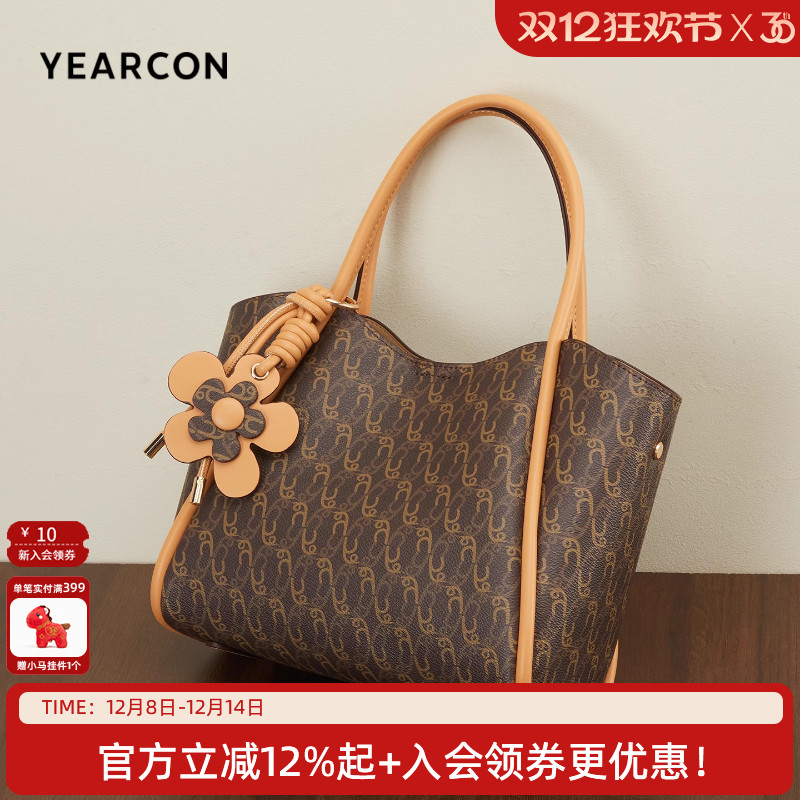 意尔康女秋冬新款大容量菜篮子包复古老花单肩包通勤pvc手提包