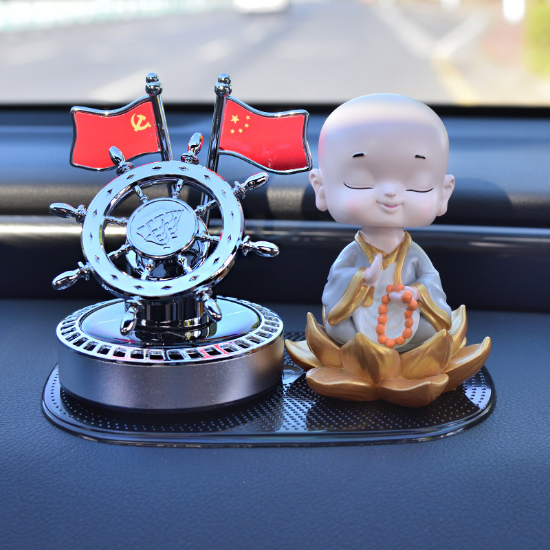 太阳能旋转汽车摆件摇头创意车载香薰香水座中控台创意内饰高档新