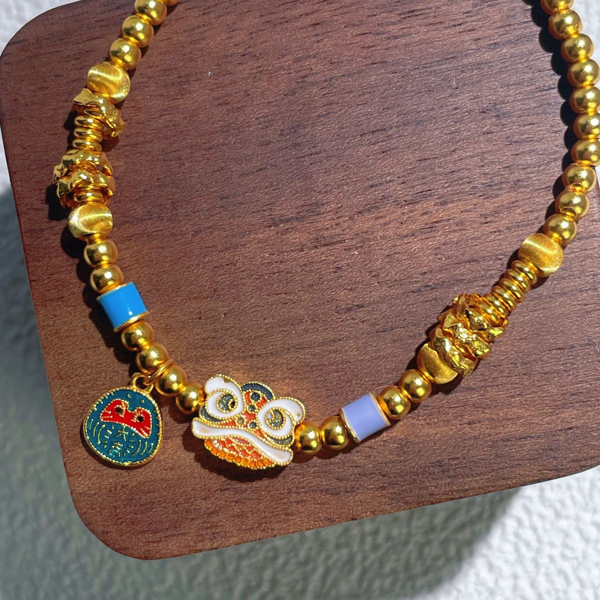 s925纯银镀黄金色手饰国潮中式虎狮盘缠手串女时尚百搭舞狮头手链