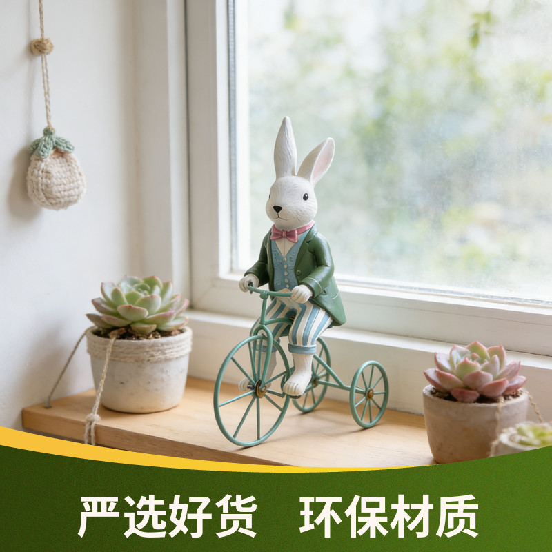 童话风兔子骑单车桌面工艺品摆件