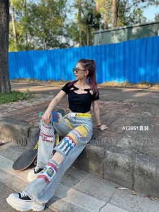欧美风设计师欧货2023夏季新款女装涂鸦字母破洞酷帅拖地牛仔裤潮