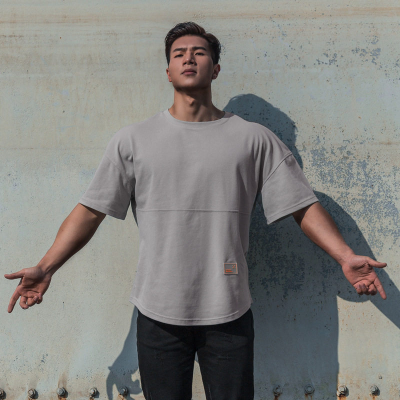 FITNESS BODYBUILDING SOLID COLOR LOOSE COTTON SHORT SLEEVES EUROPEAN SIZE IS ON THE LARGE SIDE