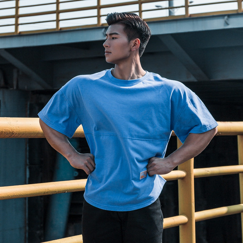 FITNESS BODYBUILDING SOLID COLOR LOOSE COTTON SHORT SLEEVES EUROPEAN SIZE IS ON THE LARGE SIDE