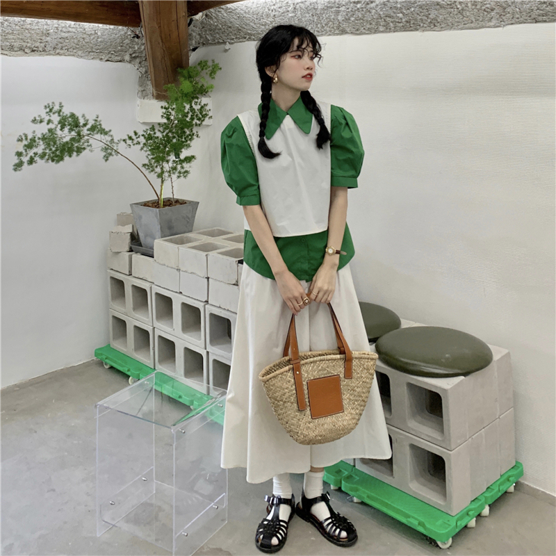 The real price is the real price. The positive and negative wear a lace up Vest + shirt + loose casual slim skirt