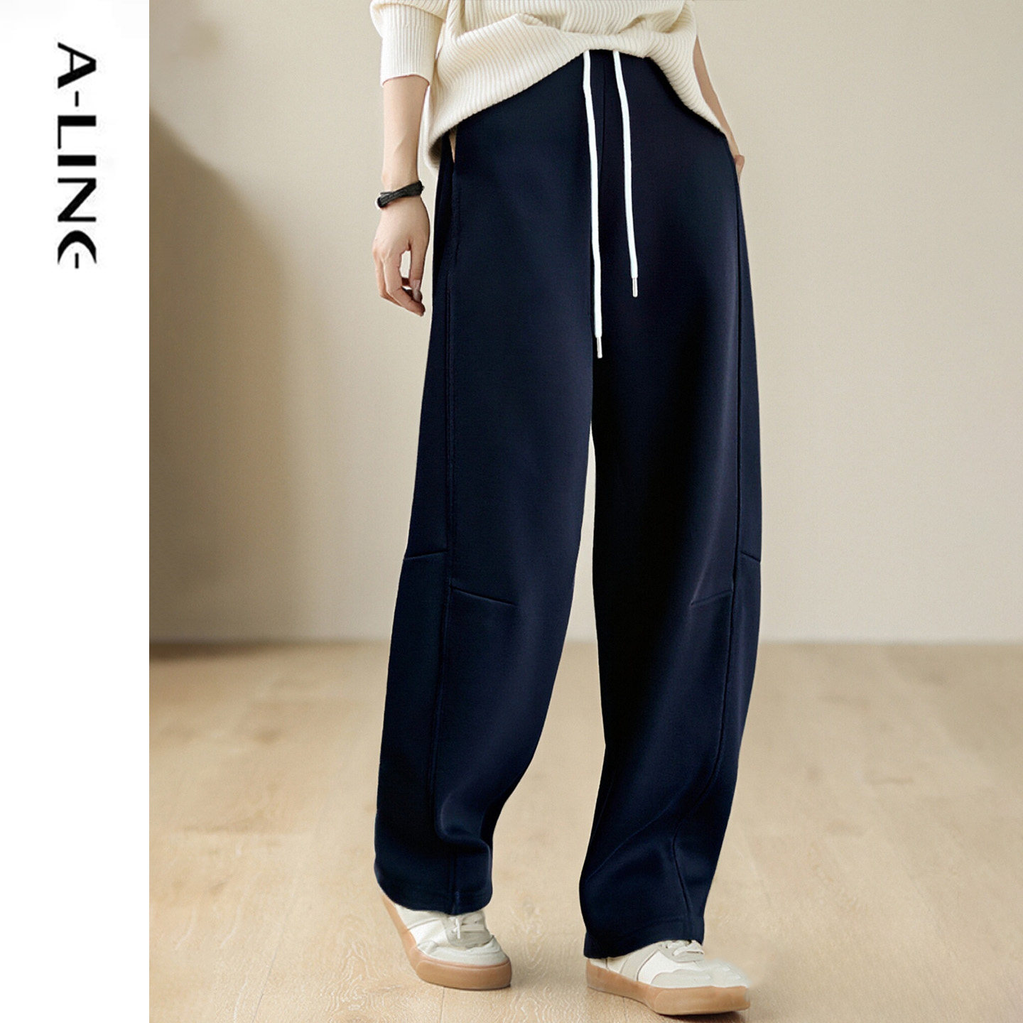 Aline/阿莱冬新品休闲感加绒加厚韩式卫裤弯刀裤 时尚穿搭推荐