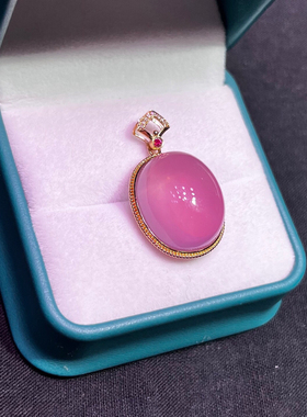 18K金吊坠5.77克，裸石重4.37克，金重1.4克，钻石9颗，红宝石1颗