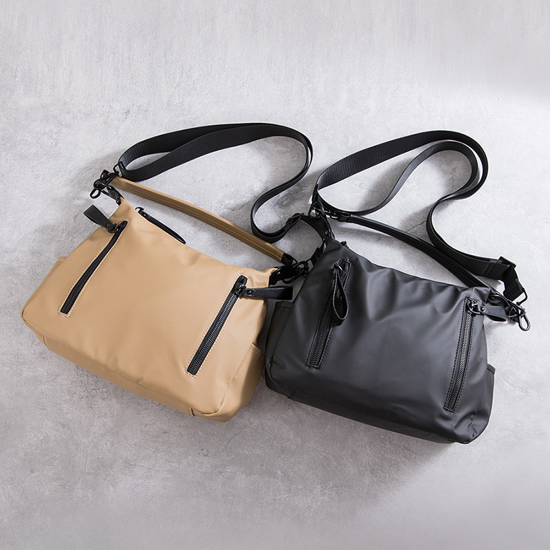 潮流男女单肩包防水休闲手提包多功能简约韩版斜挎包ins风邮差包