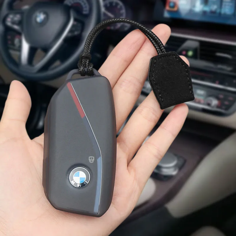 适用宝马钥匙套5系x5x17系x7x6ix新款男740li735lixmi7透黑壳包