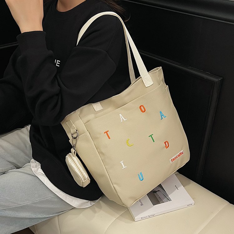 休闲大包包女2025新款时尚布包单肩包大容量托特包上课通勤斜挎包
