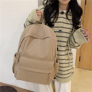灯芯绒洋气少女书包大学生韩版原创小众通勤外背包女大容量双肩包