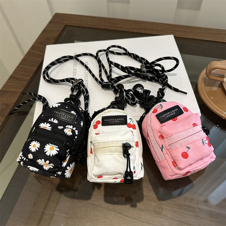 雏菊樱桃可爱小女孩洋气包包挂脖儿童零钱包耳机包宝宝迷你小挎包
