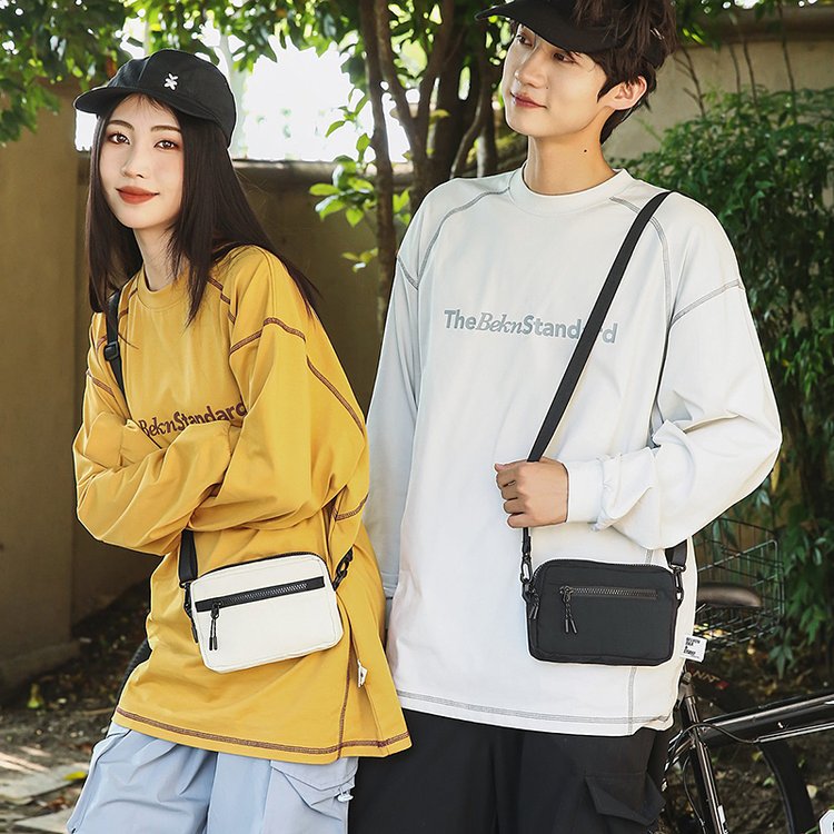 简约迷你帆布包女2025新款户外旅游轻便手机包休闲百搭斜挎小方包