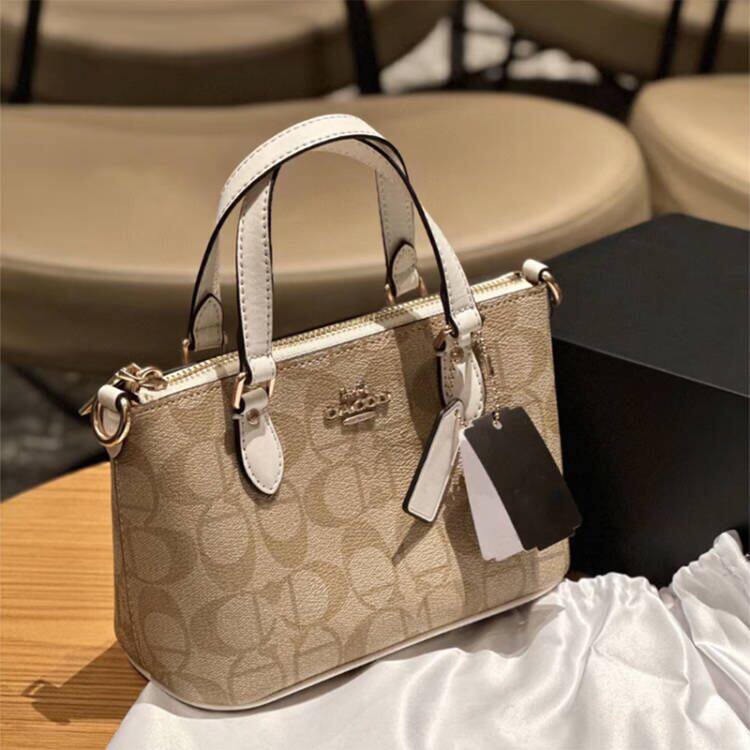 蔻家正品代购真皮手提饺子包