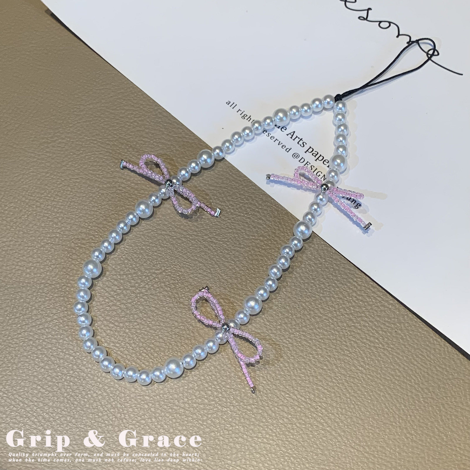 简约轻奢风手机链优雅蝴蝶结手机挂绳串珠ccd相机挂绳女款珍珠链