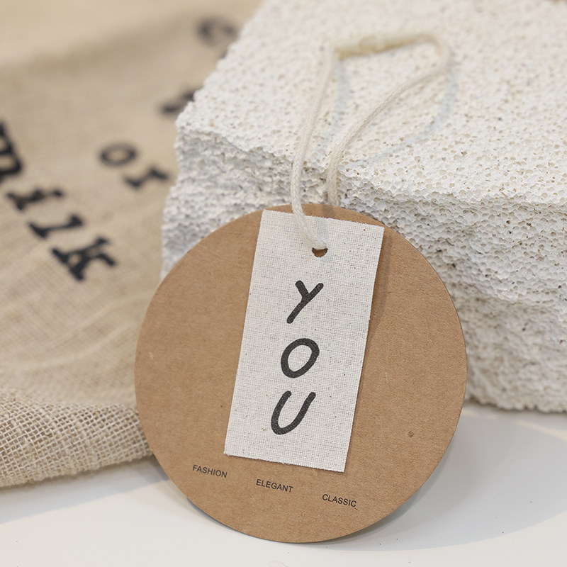 高档衣服吊牌定制牛皮纸棉麻个性吊牌印品牌logo现货通用衣服挂牌