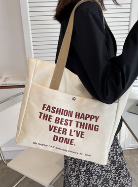 大容量帆布包女单肩斜跨字母学生款休闲百搭日韩手提拎书袋托特包