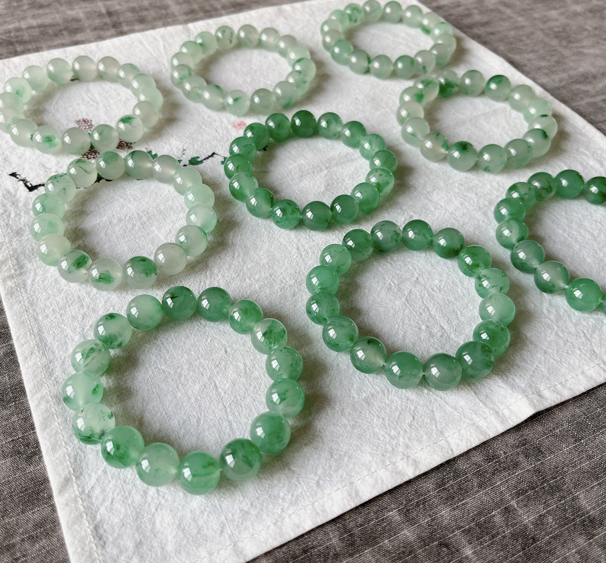 高品质纯天然非洲翠独龙玉高冰种起胶飘花13-14mm大珠子手串