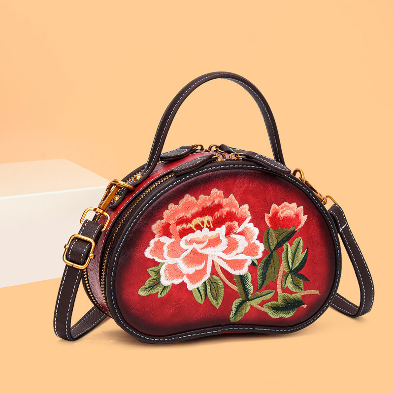 品牌手提包包女2025新款复古中国风刺绣百搭小圆包软皮单肩斜挎包